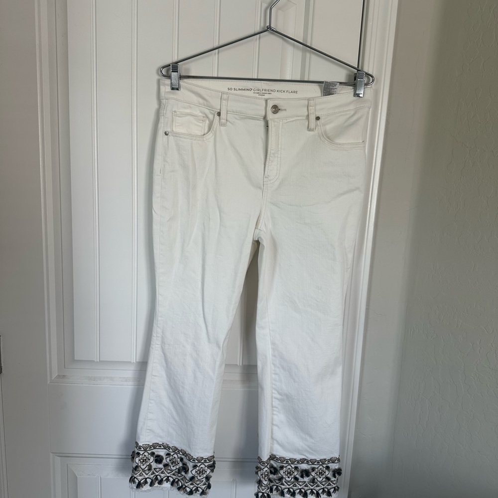 Chico's Cream Flare Jeans with Black Hem Design